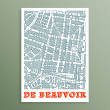 Load image into Gallery viewer, A vertical art print featuring a vintage street map of De Beauvoir, London, with a white border, light blue-grey map details, and bold red-orange text at the bottom, displayed against a muted sage green background.
